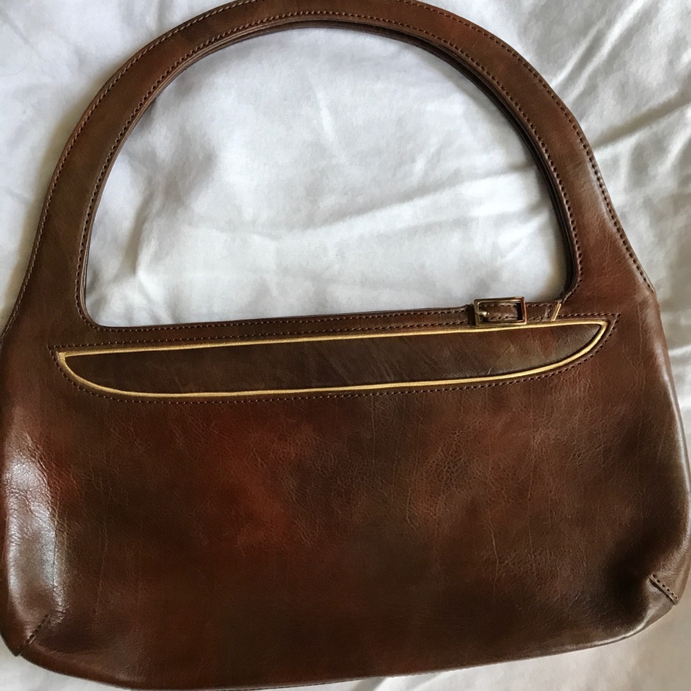 BCBG brown leather clutch.